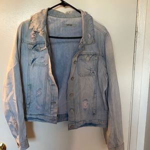 Distressed denim jacket